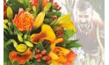 L'Agitateur Floral | image du Bouquet Surprise du fleuriste tons oranges