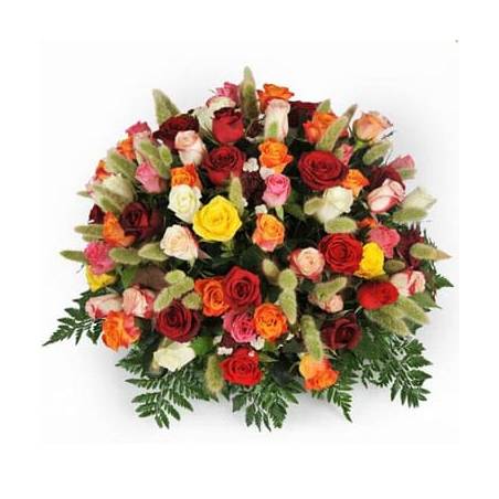 L'Agitateur Floral | image de la composition piquée de roses jaunes rouges et oranges